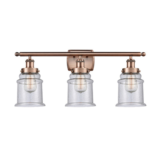 Innovations Canton 26in 3-Light Bath Vanity Light | Modern Transitional Antique Copper Steel and Seedy Textured Glass | Bathroom | Model 916-3W-AC-G184