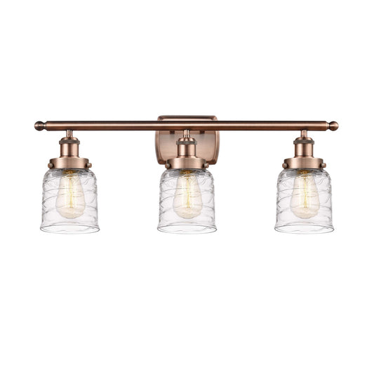 Innovations Bell 26in 3-Light Bath Vanity Light | Industrial Antique Copper Steel and Clear Deco Swirl Glass | Bathroom Vanity | Model 916-3W-AC-G513-LED