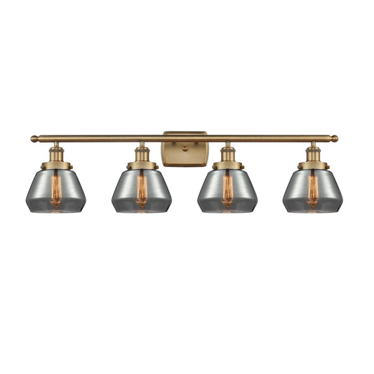 Innovations Fulton 37in 4-Light Bath Vanity Light | Brushed Brass Steel and Smoked Glass Schoolhouse Shade | Bathroom Vanity & | Model 916-4W-BB-G173