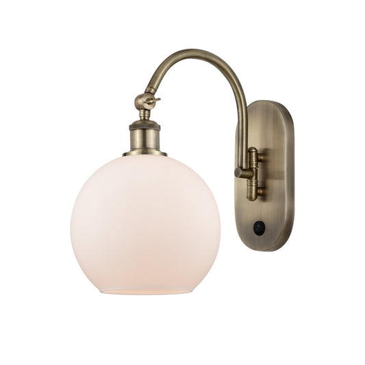 Innovations Athens 8in 1-Light Wall Sconce | Industrial Antique Brass and Matte White Glass | Bedroom & Hallway Accent | 8 x 14 in | Model 918-1W-AB-G121-8