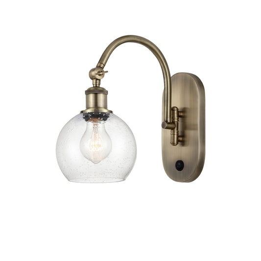 Innovations Athens 6in 1-Light Wall Sconce | Industrial Antique Brass and Seedy Glass | Bedroom & Hallway Accent | 5.88 x 11.88 in | Model 918-1W-AB-G124-6