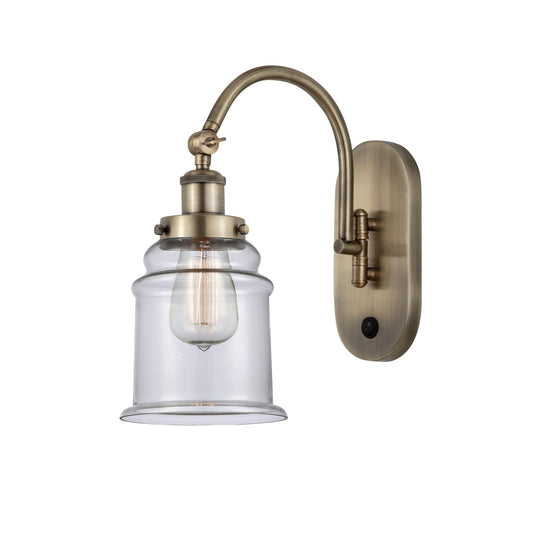 Innovations Canton 7in 1-Light Swing Arm Wall Sconce | Industrial Antique Brass and Clear Glass | Bedroom Accent Light | 6.5 x 14 in | Model 918-1W-AB-G182