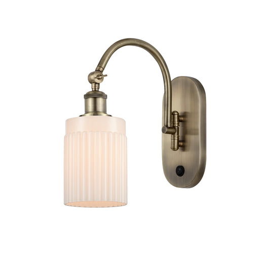Innovations Hadley 1-Light Wall Sconce | Industrial Antique Brass Steel and Matte White Ribbed Glass | Bedroom & Hallway Accent | Model 918-1W-AB-G341