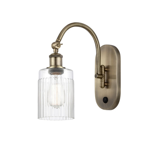 Innovations Hadley 1-Light Wall Sconce | Industrial Antique Brass Steel and Clear Ribbed Glass | Bedroom & Hallway Accent | Model 918-1W-AB-G342
