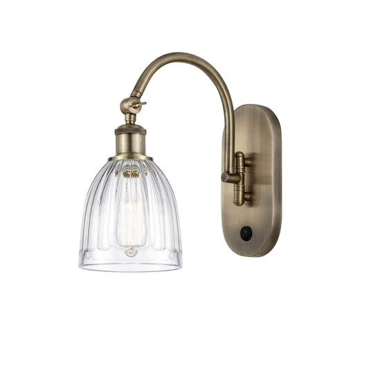 Innovations Brookfield 6in 1-Light Wall Sconce | Industrial Antique Brass Steel and Clear Ribbed Glass | Hallway & Bathroom Accent | Model 918-1W-AB-G442