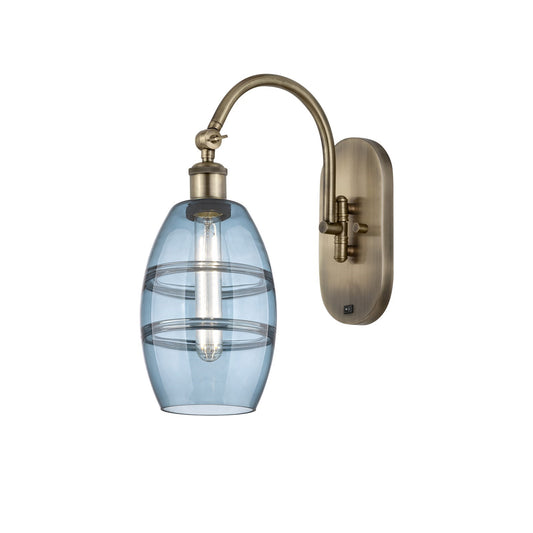 Innovations Vaz 6in 1-Light Wall Sconce | Industrial Antique Brass and Blue Glass | Bedroom & Hallway Accent | 5.88 x 12.12 in | Model 918-1W-AB-G557-6BL
