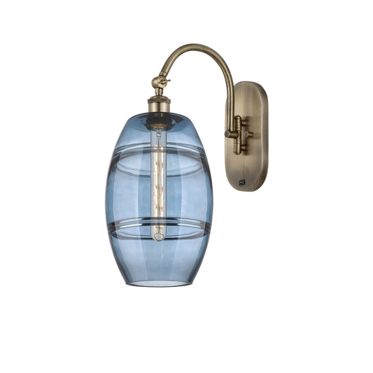 Innovations Vaz 8in 1-Light Wall Sconce | Industrial Antique Brass and Blue Glass | Bedroom & Hallway Accent | 8 x 19 in | Model 918-1W-AB-G557-8BL
