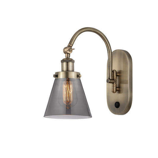 Innovations Cone 6.25in 1-Light Swing Arm Sconce | Industrial Antique Brass and Light Smoke Glass | Bedroom & Hallway Accent | Model 918-1W-AB-G63-LED