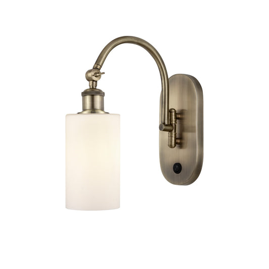 Innovations Clymer 4in 1-Light Wall Sconce | Industrial Antique Brass and Matte White Glass | Bedroom & Hallway Accent | Model 918-1W-AB-G801