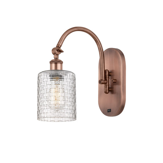 Innovations Cobbleskill 5in 1-Light Wall Sconce | Industrial Antique Copper Steel and Clear Basket Weave Glass | Hallway & | Model 918-1W-AC-G112C-5CL