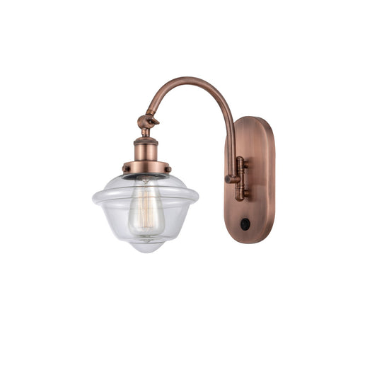 Innovations Oxford 7.5in 1-Light Swing Arm Sconce | Traditional Antique Copper Steel and Clear Glass | Bedroom & Living Room | Model 918-1W-AC-G532-LED