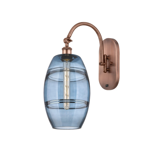 Innovations Vaz 8in 1-Light Wall Sconce | Industrial Antique Copper Steel and Blue Glass | Bedroom & Hallway Accent | 8 x 19 in | Model 918-1W-AC-G557-8BL