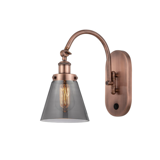Innovations Cone 6.25in 1-Light Swing Arm Wall Sconce | Industrial Antique Copper Steel and Light Smoke Glass | Bedroom & Living | Model 918-1W-AC-G63
