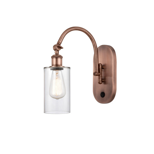 Innovations Clymer 4in 1-Light Wall Sconce | Industrial Antique Copper Steel and Clear Glass | Bedroom & Hallway Accent Light | Model 918-1W-AC-G802