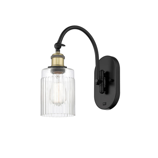 Innovations Hadley 1-Light Wall Sconce | Industrial Black Antique Brass Steel and Clear Ribbed Glass | Bathroom & Hallway Accent | Model 918-1W-BAB-G342