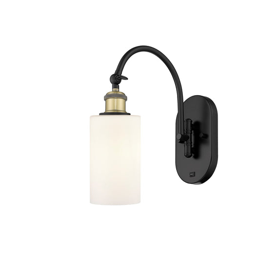 Innovations Clymer 4in 1-Light Wall Sconce | Industrial Modern Black Antique Brass and Matte White Glass | Bedroom & Hallway | Model 918-1W-BAB-G801