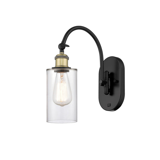 Innovations Clymer 4in 1-Light Wall Sconce | Industrial Modern Black Antique Brass and Clear Glass | Bedroom & Hallway Accent | Model 918-1W-BAB-G802