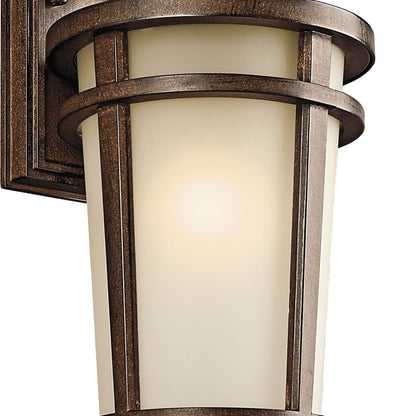 Kichler Atwood 1-Light Outdoor Wall Sconce | Transitional Brown Stone and Light Umber Mist Glass | Covered Patio & Entryway | Model 49072BST