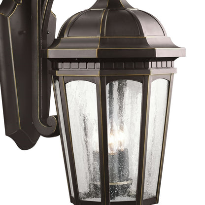Kichler Courtyard 22in 3-Light Outdoor Wall Sconce | Traditional Rubbed Bronze and Clear Seeded Glass | Covered Patios & Entryways | Model 9034RZ