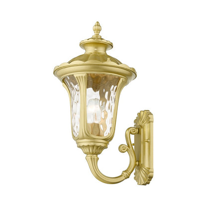 Livex Oxford 1 Lt Outdoor Med Wall Lantern, Gold/Clear Water