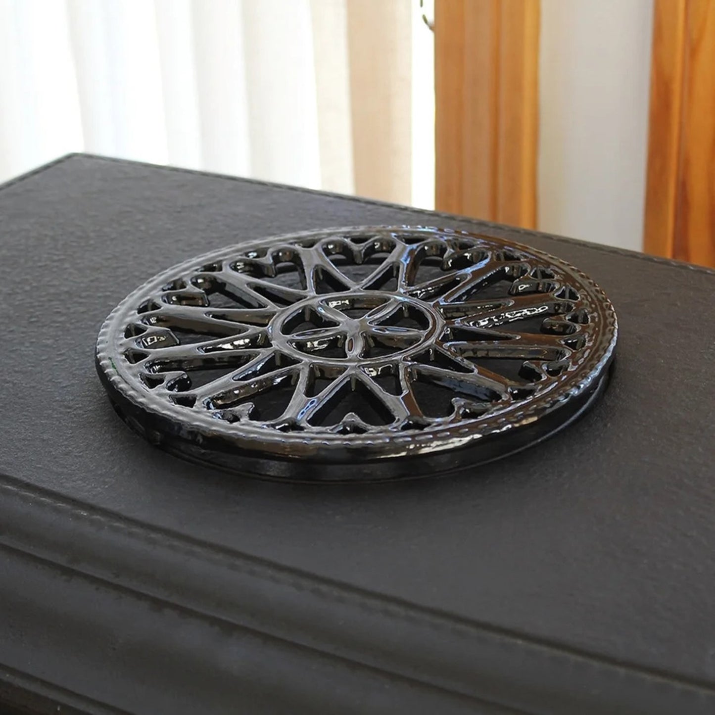 Minuteman International 7in Sunburst Cast Iron Trivet | Black Porcelain Enamel | Kitchen & Dining Room Heat Protection | 7 x 0.5 x 7 in | Model C-33BK