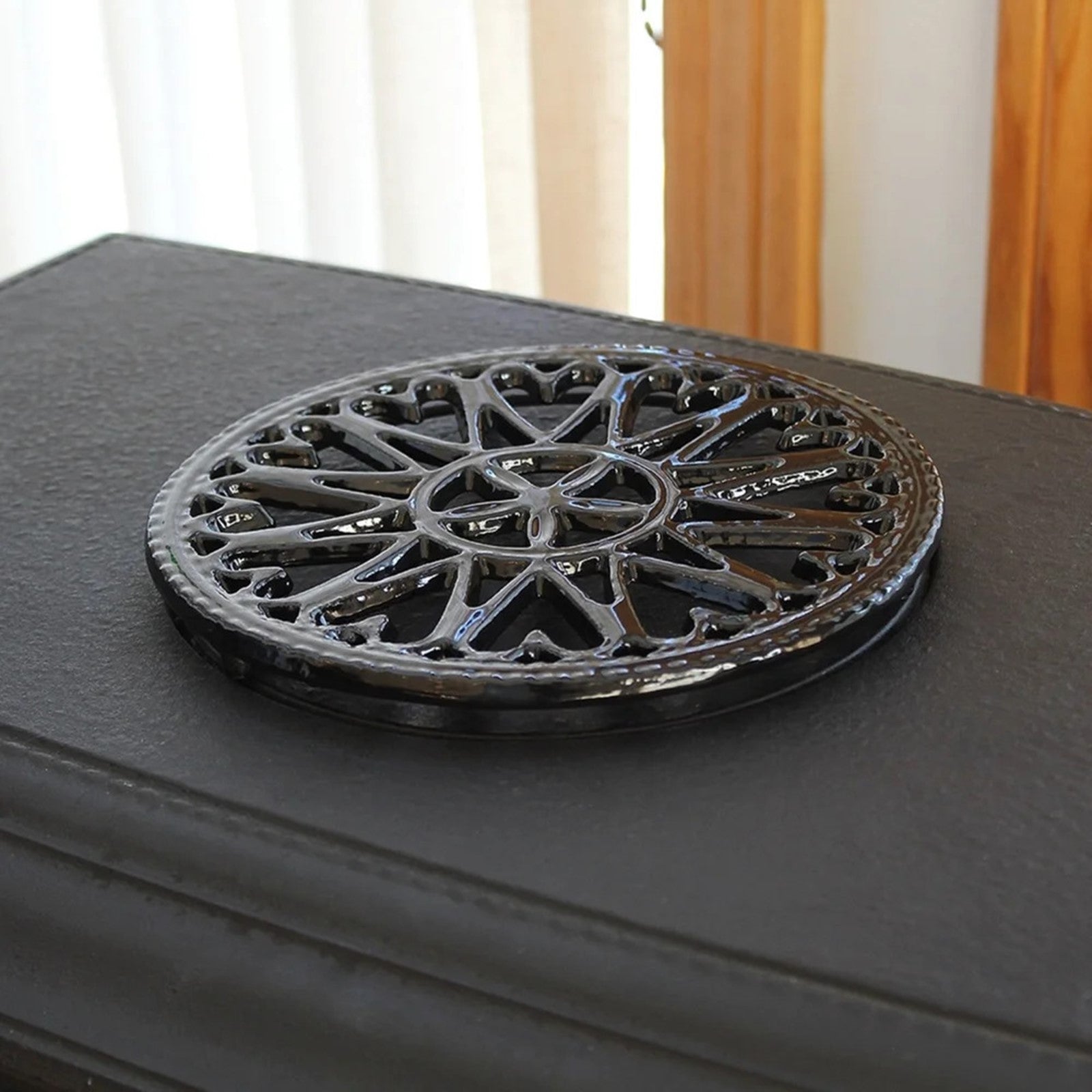 Minuteman International 7in Sunburst Cast Iron Trivet | Black Porcelain Enamel | Kitchen & Dining Room Heat Protection | 7 x 0.5 x 7 in | Model C-33BK