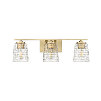 Millennium Lighting Saben 3Lt Vanity, Vintage Brass/Clear - 22103-VB