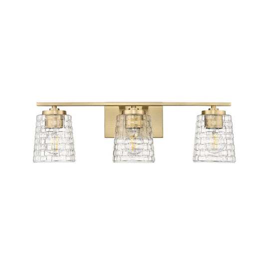 Millennium Lighting Saben 3Lt Vanity, Vintage Brass/Clear - 22103-VB