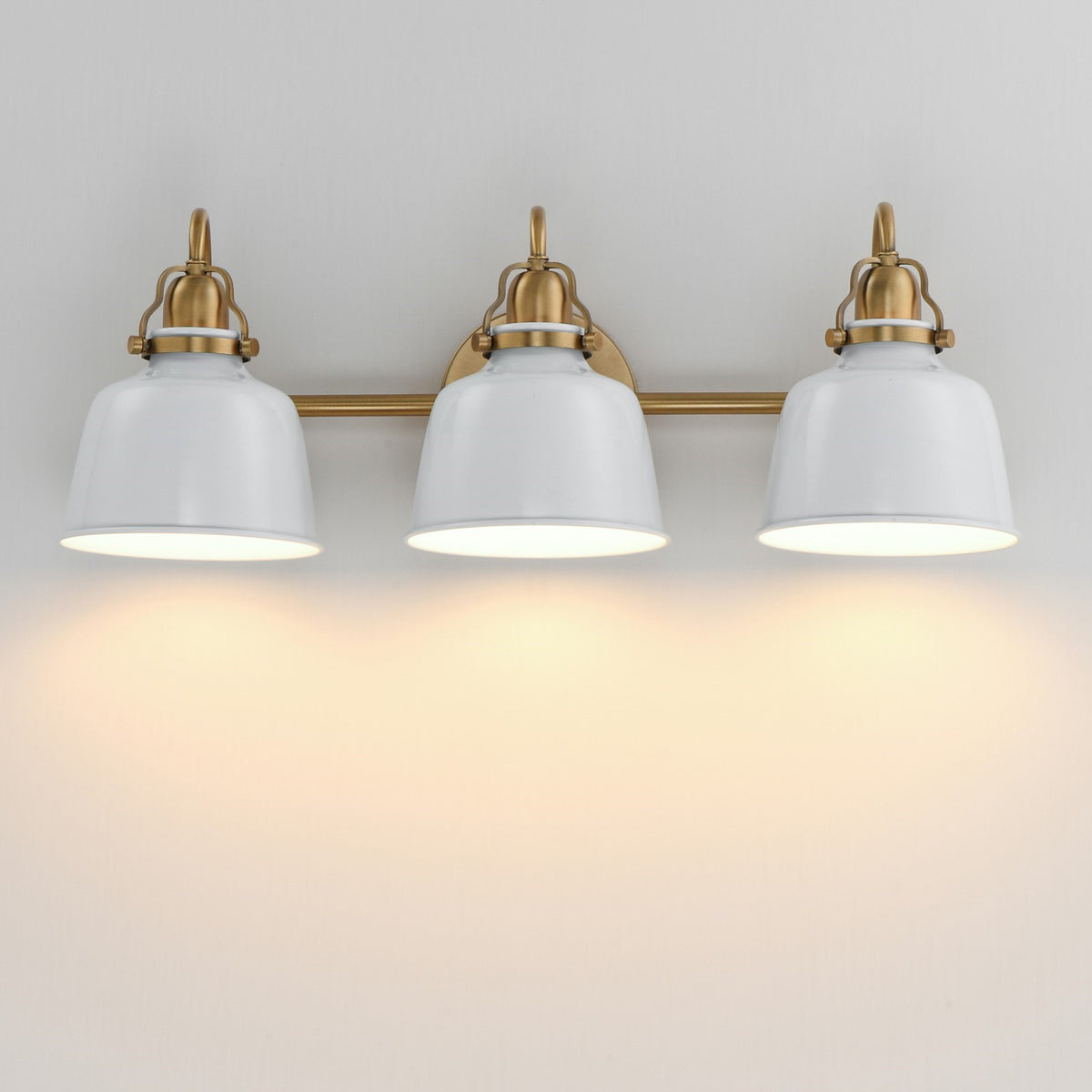 Maxim Hollis 24in 3-Light Wall Sconce | Farmhouse Natural Aged Brass and Glossy White Steel | Bathroom & Hallway | 24 x 9 in | Model 21423GWNAB