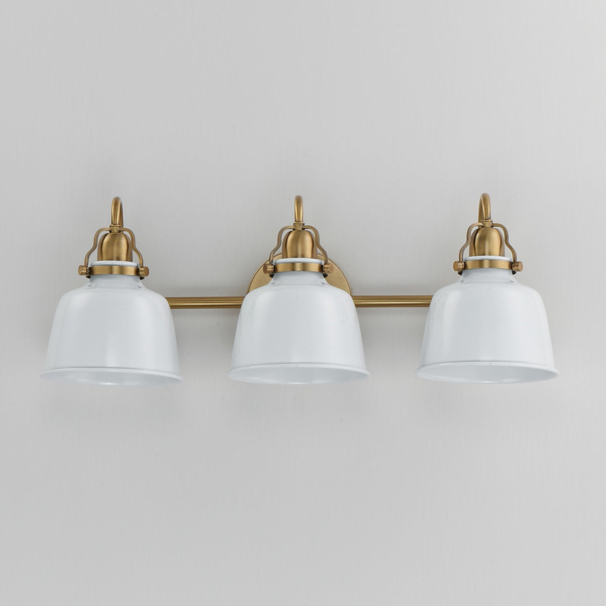 Maxim Hollis 24in 3-Light Wall Sconce | Farmhouse Natural Aged Brass and Glossy White Steel | Bathroom & Hallway | 24 x 9 in | Model 21423GWNAB