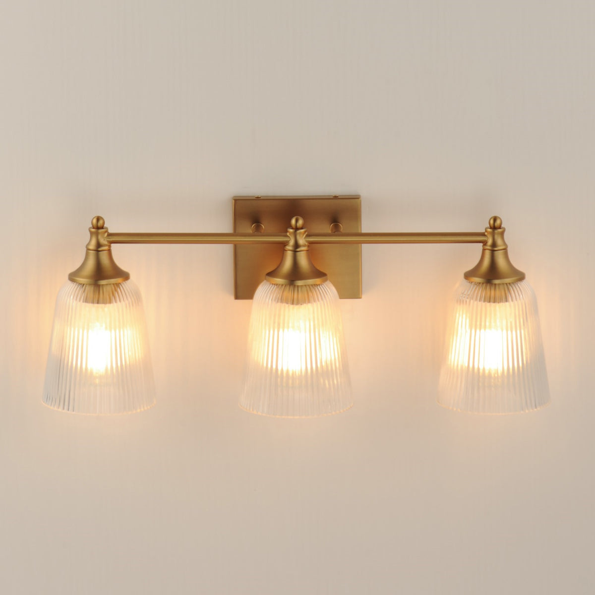 Maxim Lighting Julip 23in 3-Light Bath Vanity | Traditional Natural Aged Brass and Clear Ribbed Glass | Bathroom Vanity & Powder | Model 21543CRNAB