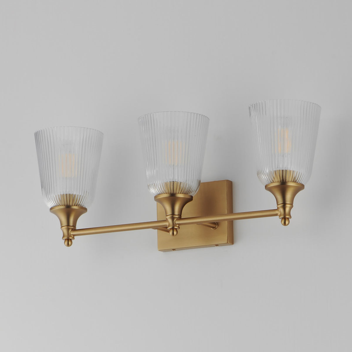 Maxim Lighting Julip 23in 3-Light Bath Vanity | Traditional Natural Aged Brass and Clear Ribbed Glass | Bathroom Vanity & Powder | Model 21543CRNAB