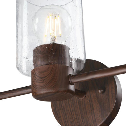 Westinghouse Sylvestre 15in 3-Light Vanity Light | Transitional Walnut and Clear Seeded Glass | Bathroom & Powder Room | 15 x 6 x 8 in | Model 6126500